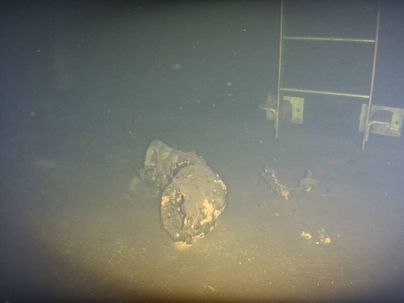 Sediment and debris found on a water tank floor during inspection